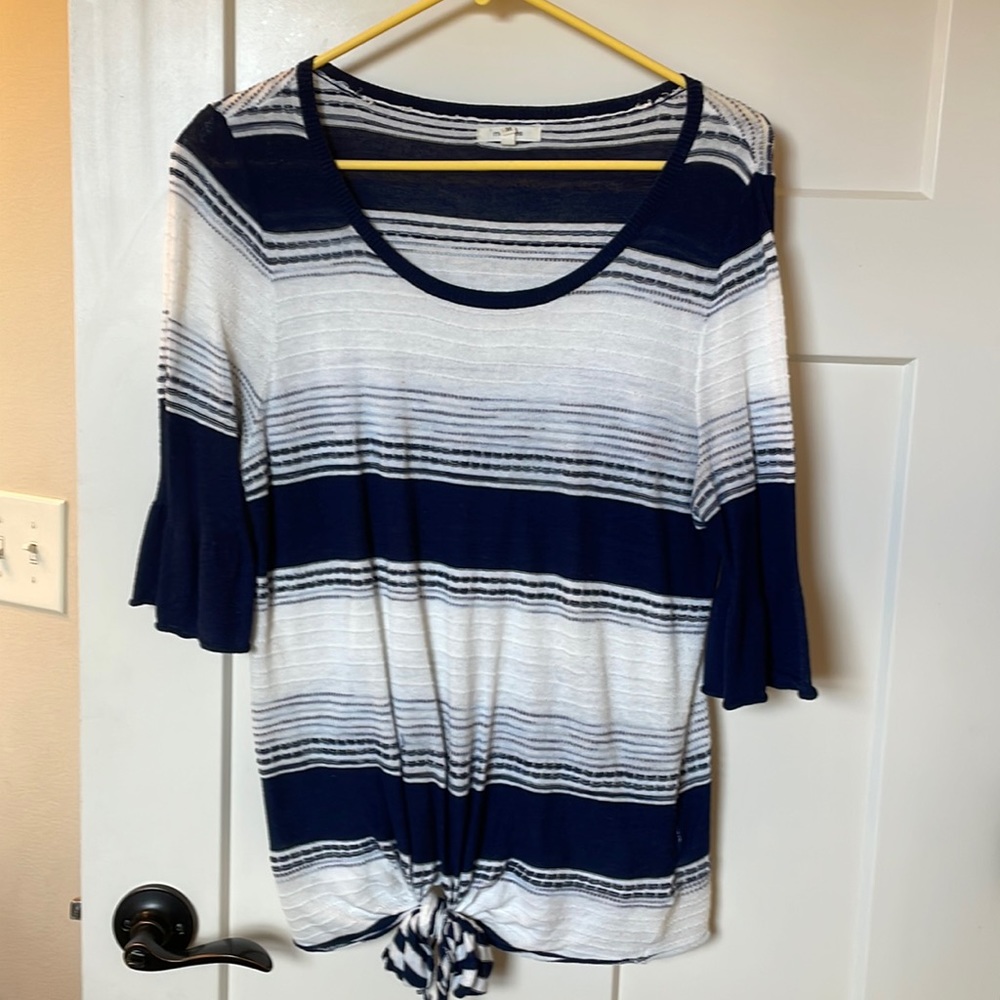 Three quarter length sweater.